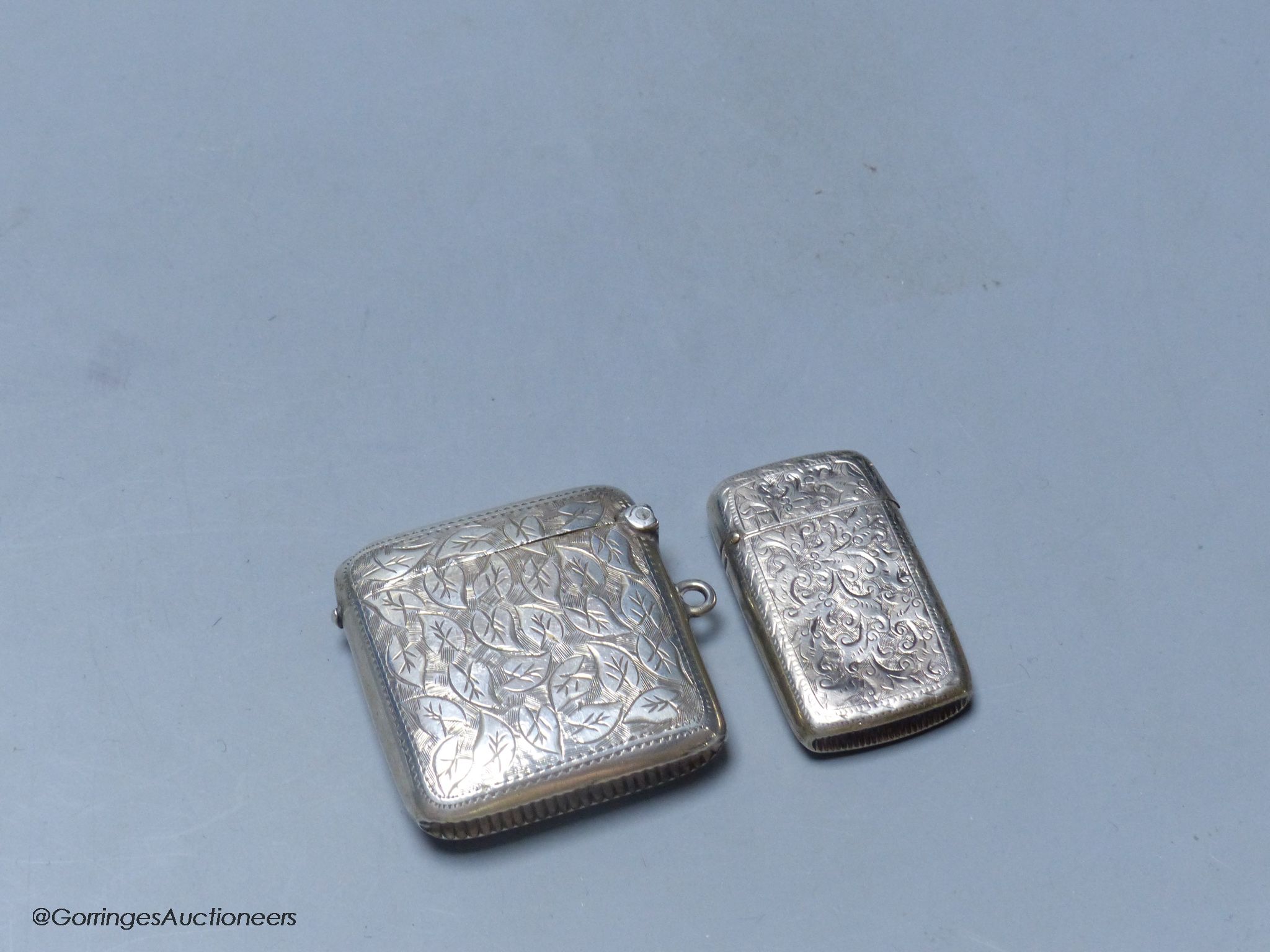 Two early 20th century silver vesta cases, largest 42mm.